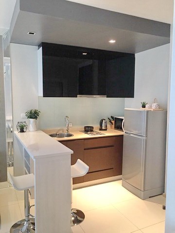 Condominium for rent Jomtien showing the dining and kitchen Condominium for rent Jomtien showing the dining and kitchen